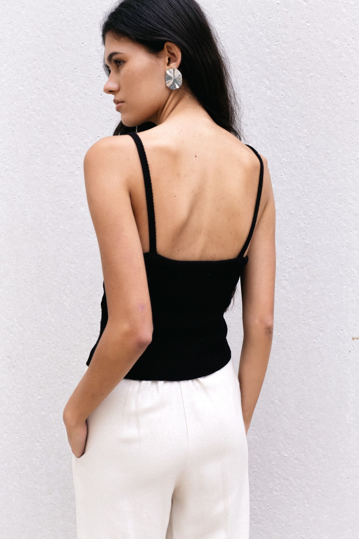 Espalda de top crop negro Zenda Couture